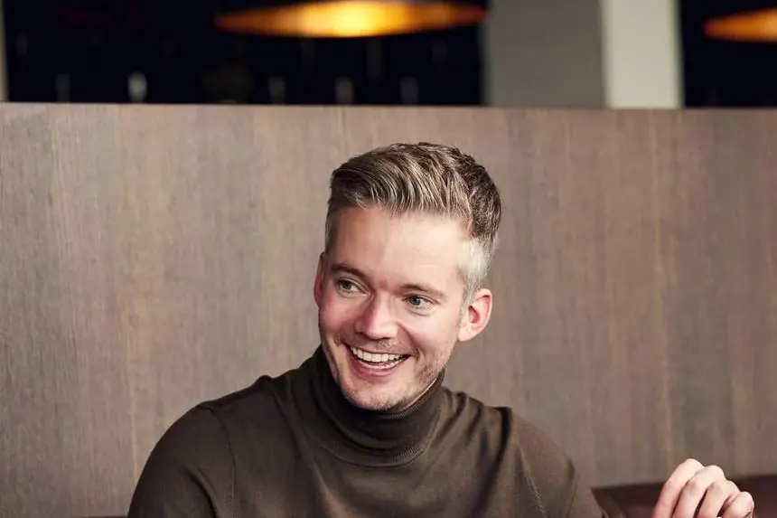 A guest enjoys a dish in restaurant BØFF